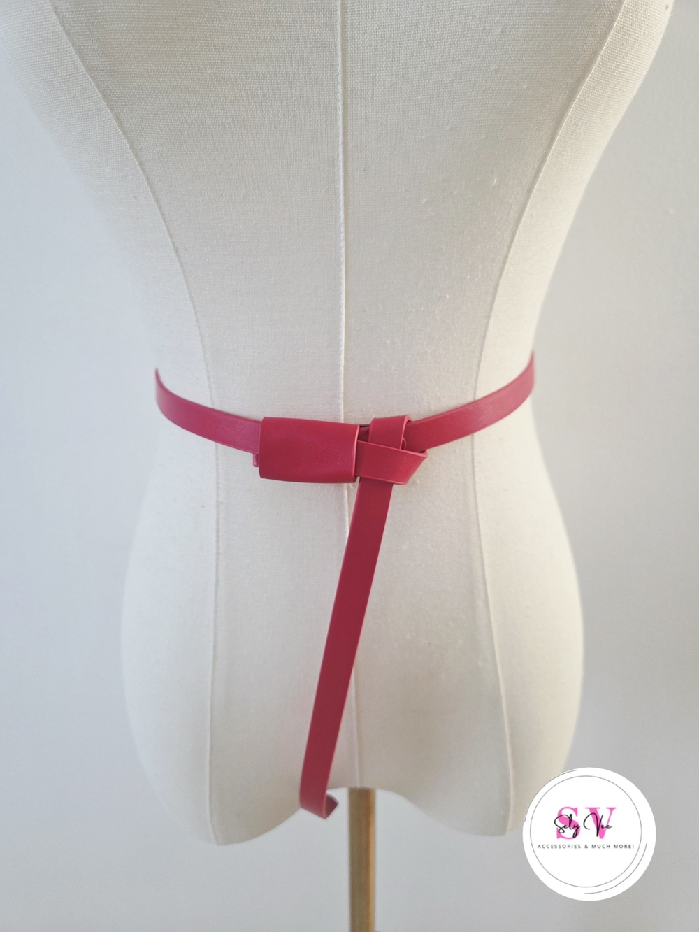 Red loop around thin belt